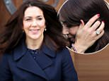 Princess Mary shows off her sparkling diamond ring to attend church