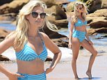 Natalie Roser flaunts slender frame and trim pins in high-waisted bikini bottoms after rumoured split from fiancé Dan Adair