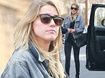 Amber Heard looks happy and relaxed with girl friends as she's seen in public for first time since divorce from Johnny Depp finalized