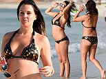 Bikini-clad Danielle Lloyd shows off curves