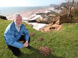 Resident of cliffside street sees shed disappear into sea