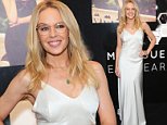 Kylie Minogue stuns in Sydney in white lace tassle dress