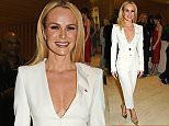 Amanda Holden suffers wardrobe malfunction after glam bash