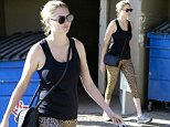 Kate Upton shops in eye-catching leopard print leggings