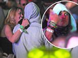 Coachella: Orlando Bloom gets up close with mystery blonde