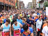 Defiance of Manchester: Thousands take to streets for run