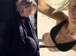 Lara Bingle shows off her toned stomach in a  bikini