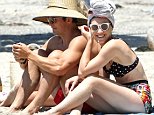 Orlando Bloom spends beach day with Katy Perry lookalike