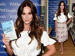 Vicky Pattison greets her fans in a demure floral skirt