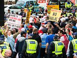 EDL and anti-fascist groups square up in central London 