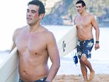 Home And Away's James Stewart shows off fit form at beach