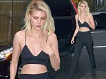 Nicola Peltz flaunts her taut stomach in NYC