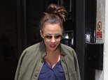 Caroline Flack puts head down amid Mike Thalassitis claims