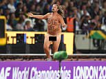 Streaker runs across the track at the World Championships