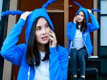 Olivia Munn wears insect sweater to promote The Tick