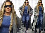 Jennifer Lopez sports long blonde hair and double denim