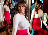 Melania Trump wears festive red skirt