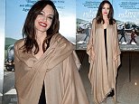 Angelina Jolie looks carefree at Faces Places premiere