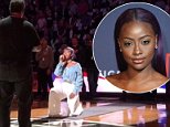 Justine Skye kneels after performing national anthem