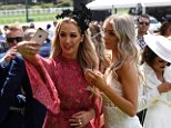 Glamorous punters crack open tinnies at the Cox Plate