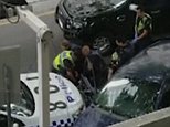 Bourke Street: Man, 26, charged after 'ramming police'