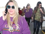 Kesha flies out of LAX with boyfriend Brad Ashenfelter