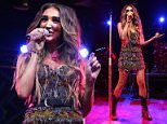 Ex-TOWIE star Megan McKenna performs at London's Scala