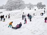 Parents' fury as thousands of schools are closed over snow