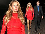 Paris Hilton puts on leggy display in red lace minidress