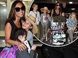 Myleene Klass steps out with Simon Motson and their brood