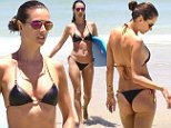 Alessandra Ambrosio strips down to a tiny bikini