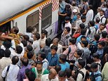 Mumbai passengers trample each other during rush-hour