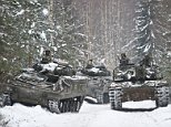 British troops take tanks out on patrol in wintry Estonia