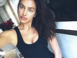 Irina Shayk poses on the edge of eternity pool