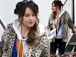 Dakota Johnson in hair curlers on the set of her new film