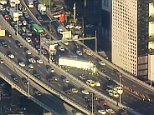 Ruck jackknifes on major Melbourne freeway blocking all four lanes