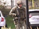 Man 'armed with assault rifle takes hostages at veterans' home'