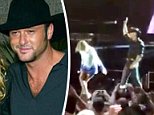 Tim McGraw collapses during performance due to dehydration