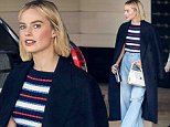 Margot Robbie sports stylish bell-bottoms and stripes to brunch