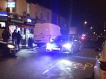 Teenager is stabbed and another has liquid substance thrown in his face in mass brawl in Birmingham 