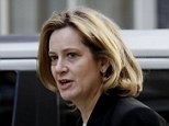 Home Secretary denies police cuts are to blame for spate of stabbings and shootings