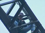 Man climbs the Sydney Harbour Bridge – with police warning it could SHUT DOWN for peak-hour rush