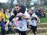 Woman injured after her partner drops her on her HEAD during the UK Wife Carrying championships