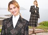 Lily James puts on a quirky display in tweed coat in Guernsey
