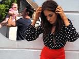 Binky Felstead slips into polka blouse as she enjoys weekend away