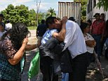 Migrants who tried to enter the United States illegally arrive back in Guatemala and Honduras