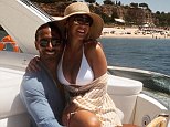 Kate Wright flaunts cleavage in white bikini with beau Rio Ferdinand