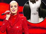 Katy Perry gets a new tattoo in Sydney to commemorate the end of her Witness tour