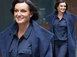 Cassandra Thorburn can't wipe the smile off her face as she leaves Channel Seven's Sydney HQ